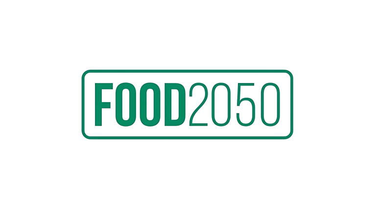 FOOD2050 Das Bild zeigt den Text „FOOD 2050“ in fetten grünen Buchstaben zentriert innerhalb eines dünnen grünen rechteckigen Rahmens auf weißem Hintergrund.