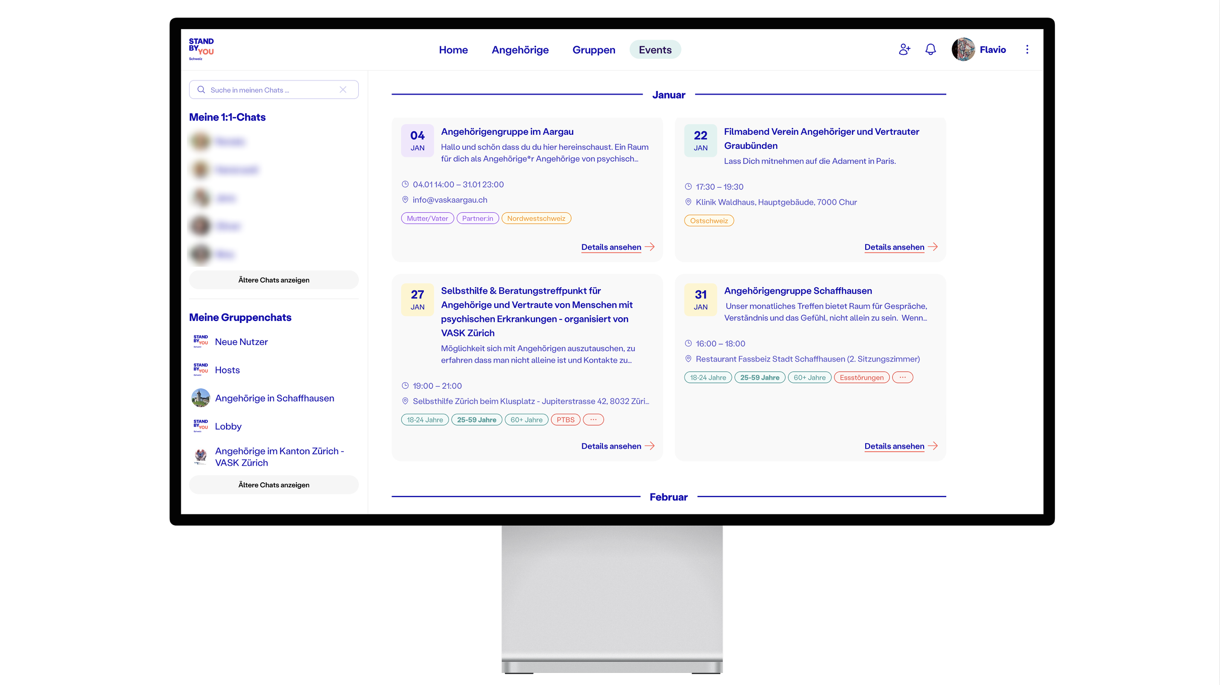 A computer monitor displays a German website with chat groups, group lists, and event details for support and counseling, featuring a calendar layout for January events. Showcasing its role as a volunteer platform, user profile and menu options are visible at the top. A computer monitor displays a German website with chat groups, group lists, and event details for support and counseling, featuring a calendar layout for January events. Showcasing its role as a volunteer platform, user profile and menu options are visible at the top.